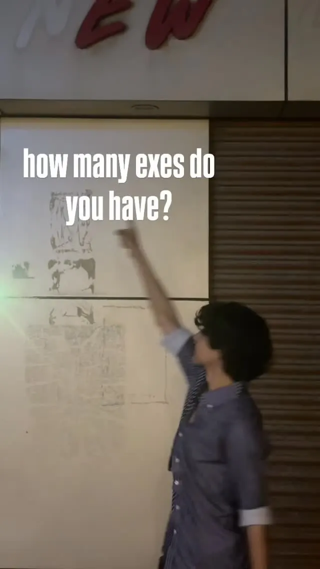 Aayan pointing at a wall under the caption 'how many exes do you have?'
